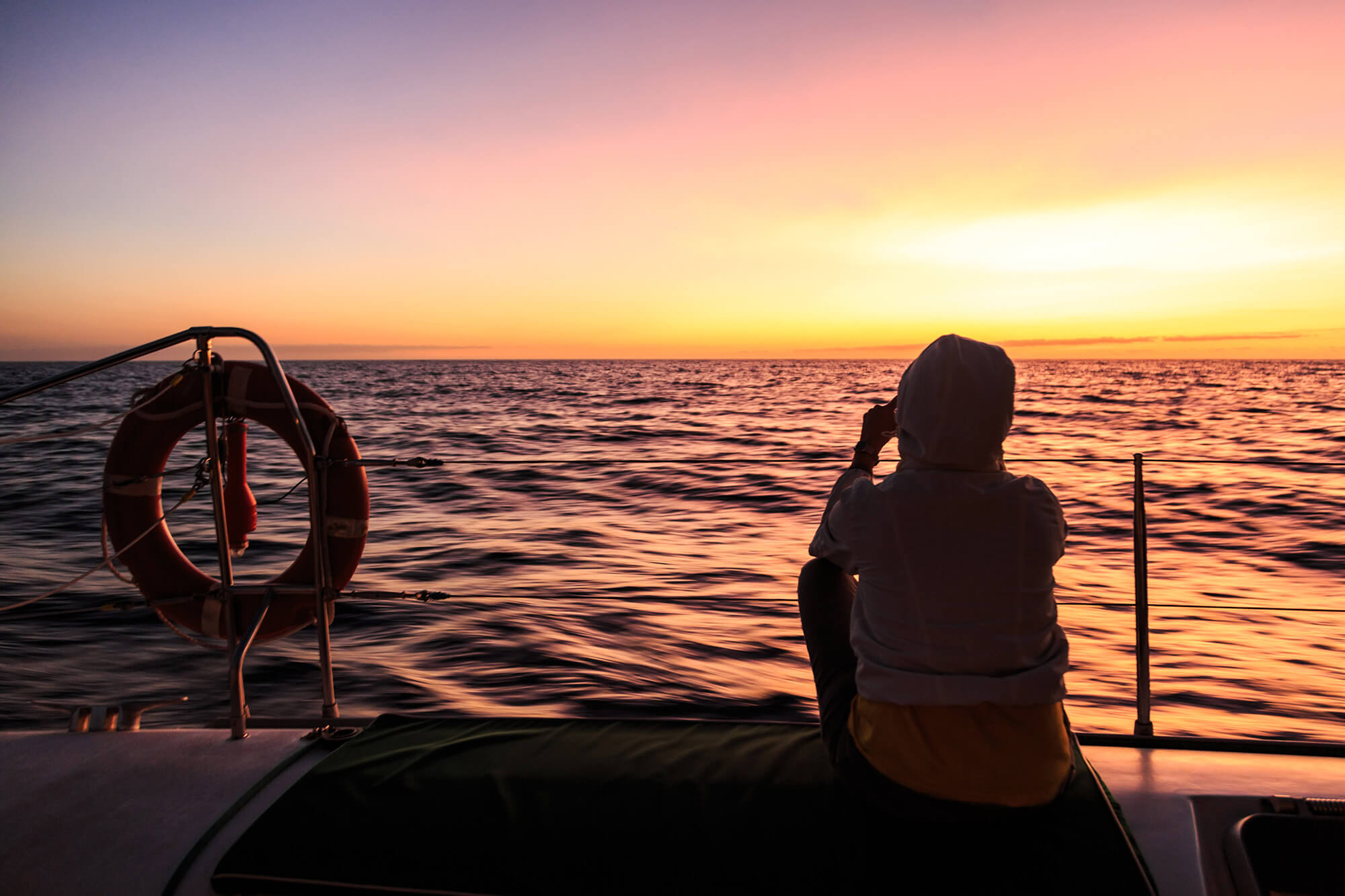 Sunset boat tour near Alcanada lighthouse, Mallorca